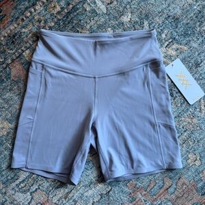 RHONE Revive pocket bike short 6” NWT blue lavender
